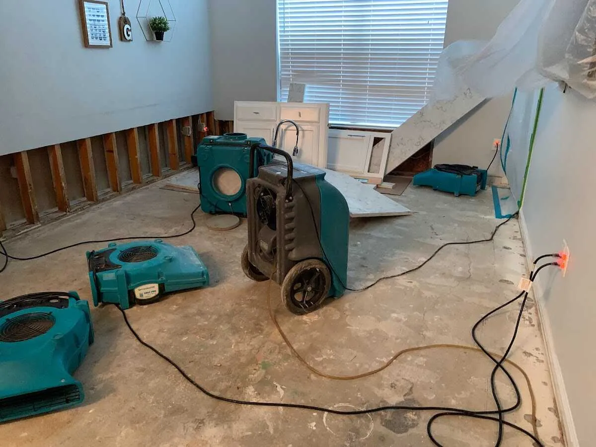 Dehumidifier in flood-cut room for Water Damage Restoration in Fairfax Station